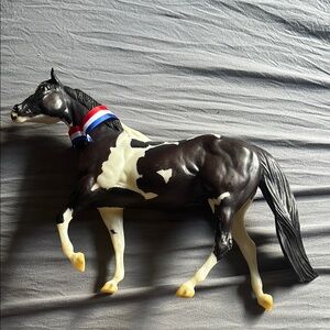 Black and White Horse Figurine with Ribbon
